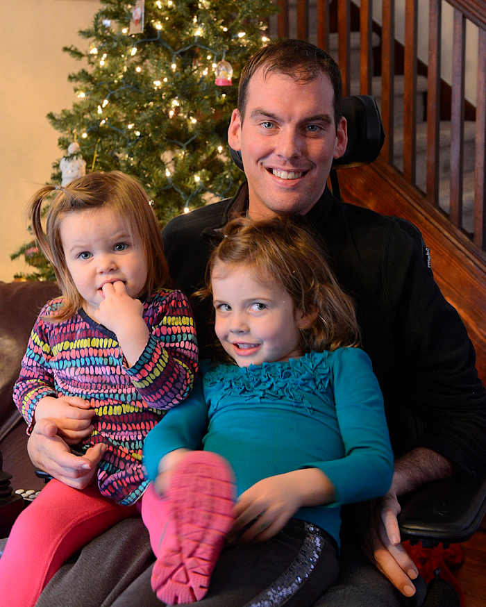 Onyshko (with daughters in 2013) believes suffering “at least 20” concussions led to his developing ALS.